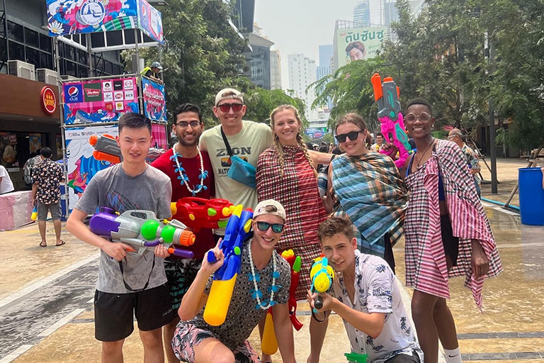 A group of students in the 3/2 MBA accounting field study program in Thailand attend the Songkran Festival.