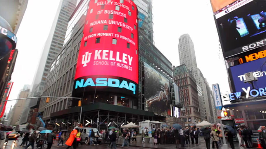 the Kelley logo on a screen on the NASDAQ exterior in New York City